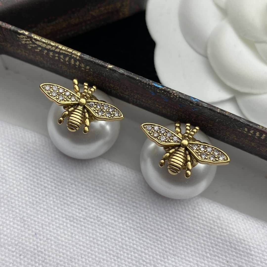 7 Star Chr1st1an D10r Earring