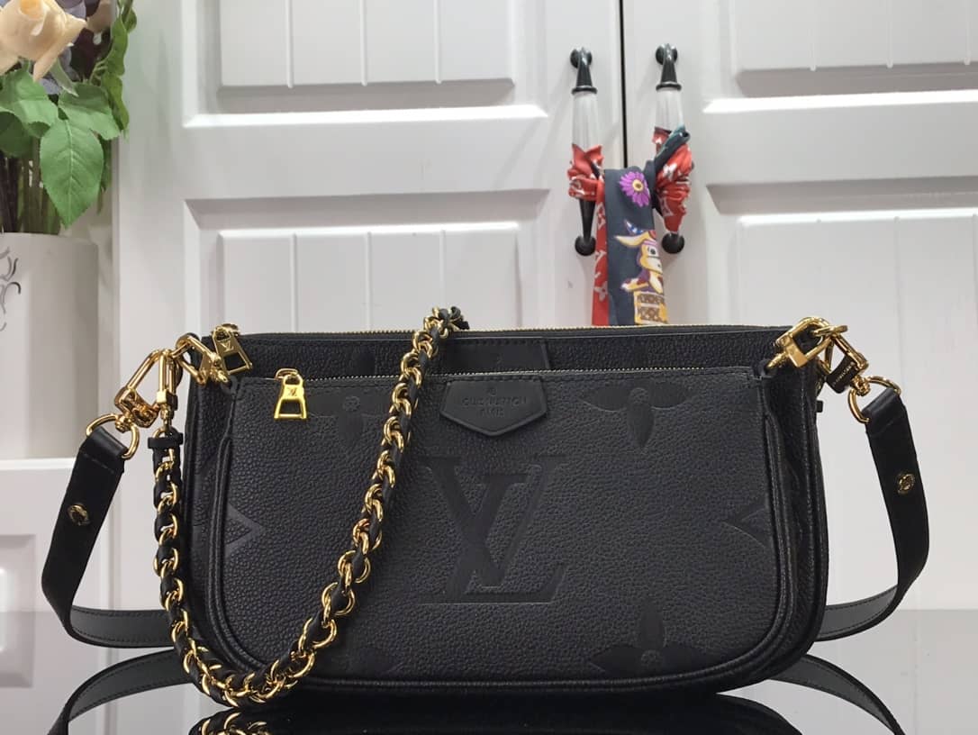 L0vis Vvtt0n Pochette Discovery Compact Replica Wallet Black M57630