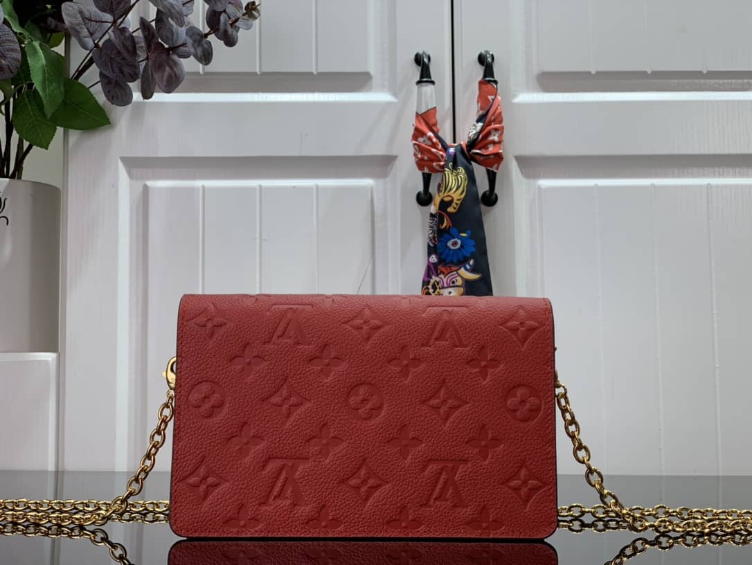 L0vis Vvtt0n Vavin Chain Empreinte Leather Replica Bag Red M63398