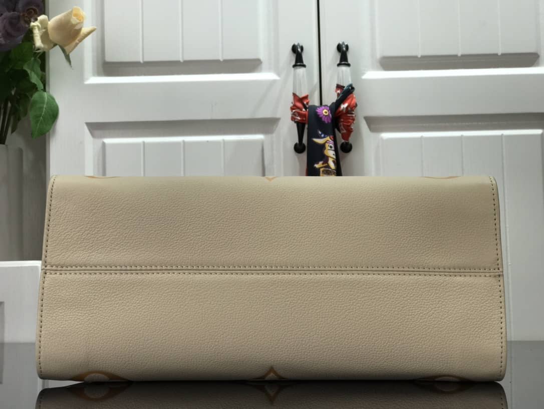 L0vis Vvtt0n On the Go MM Monogram Empreinte Two-way Tote Replica Apricot M45717