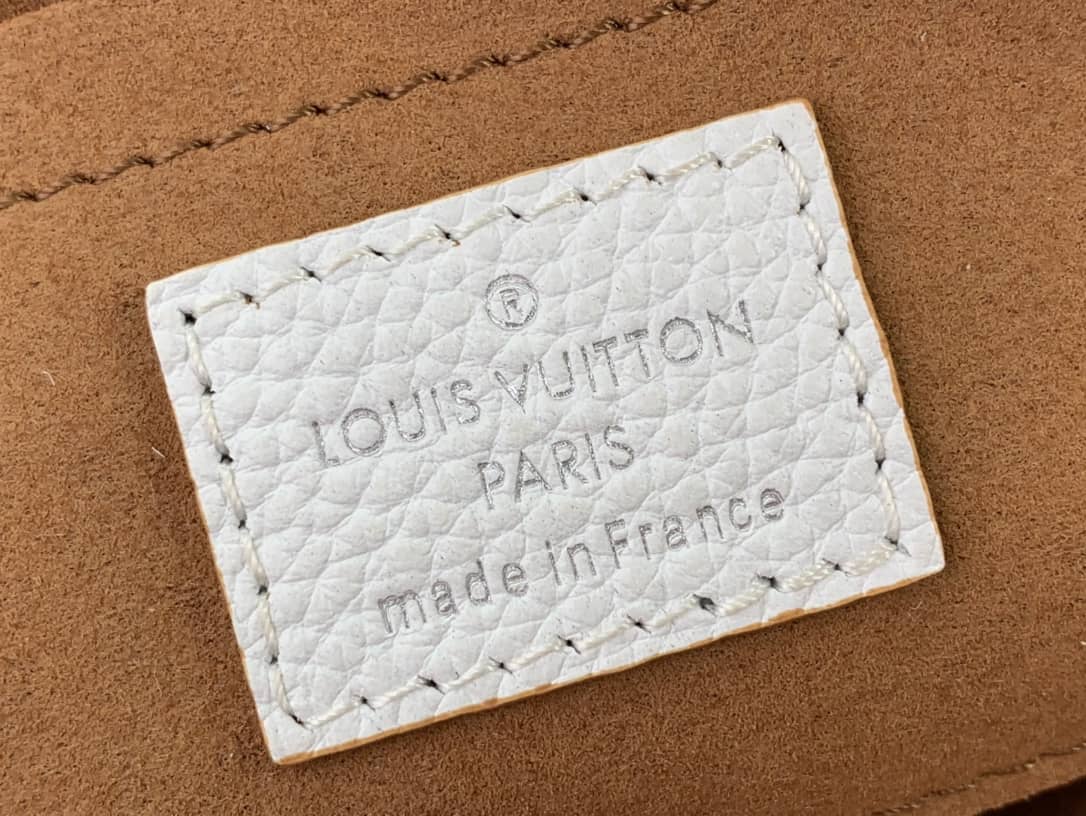 L0vis Vvtt0n Scala Mini Pouch Mahina Leather Replica Bag M80410