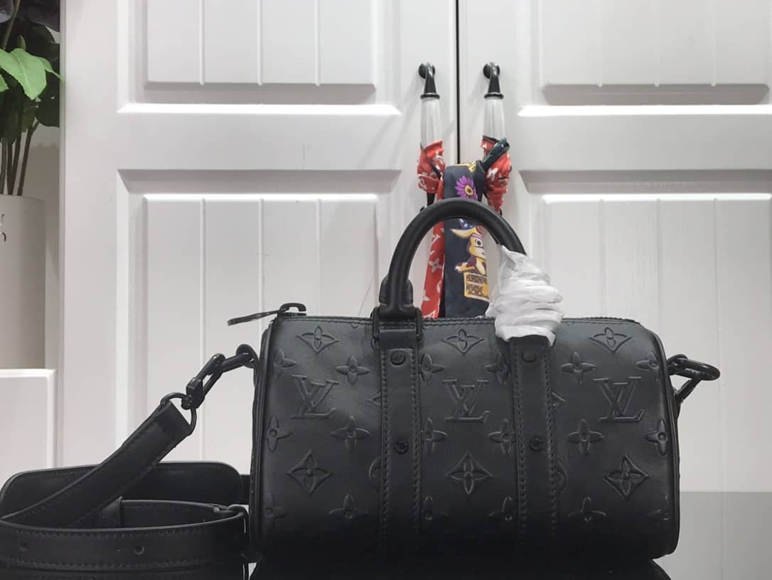 L0vis Vvtt0n Keepall XS Monogram Seal Cowhide Leather Bag Replica Black M57960