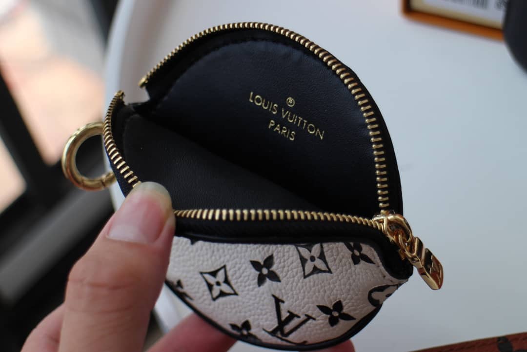 L0vis Vvtt0n Crafty Trio Pouch Monogram Empreinte Replica M69516