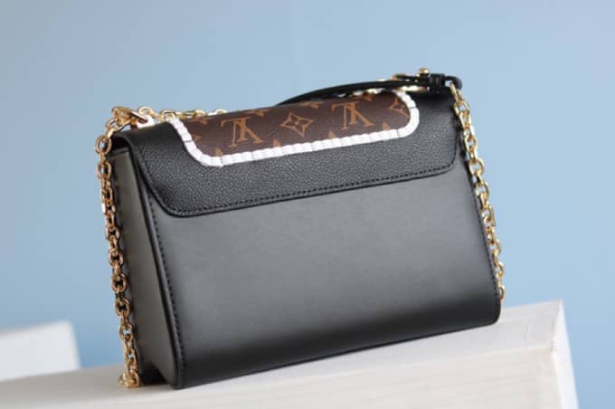 L0vis Vvtt0n Textured Epi Leather Twist Series Bag