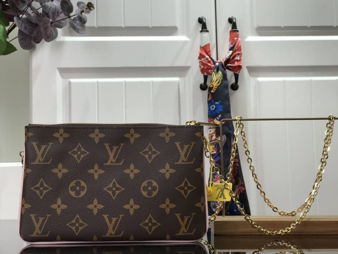 L0vis Vvtt0n Pochette Double Zip Christmas Limited Collection Replica Bag M69744