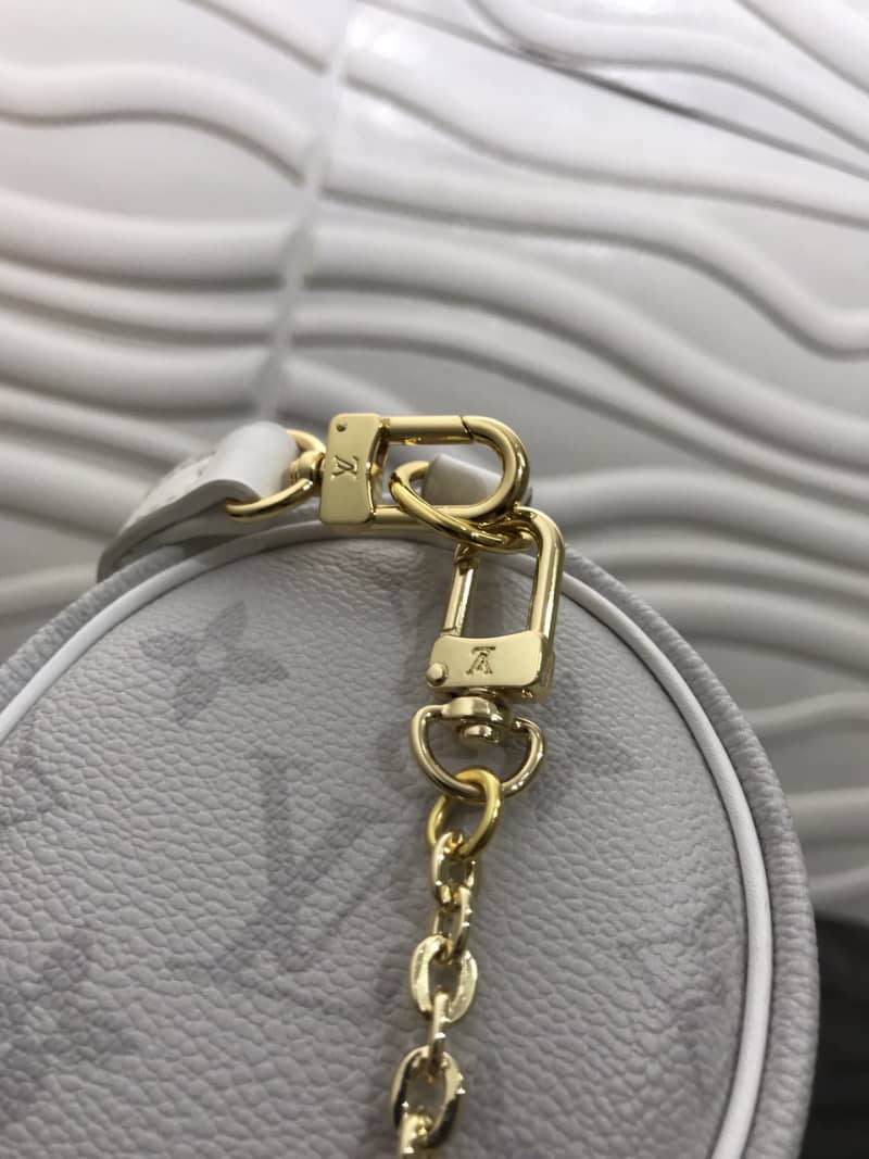 L0vis Vvtt0n Monogram Canvas Mini Round Replica Pochette White M40713