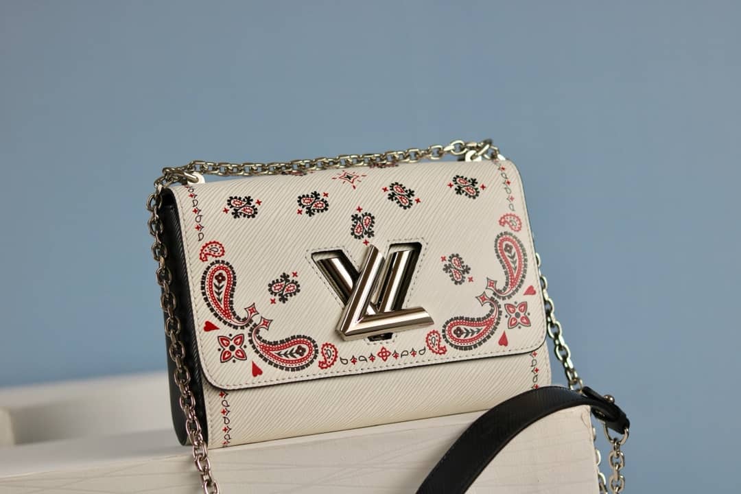 L0vis Vvtt0n Textured Epi Leather Twist Series Bag White