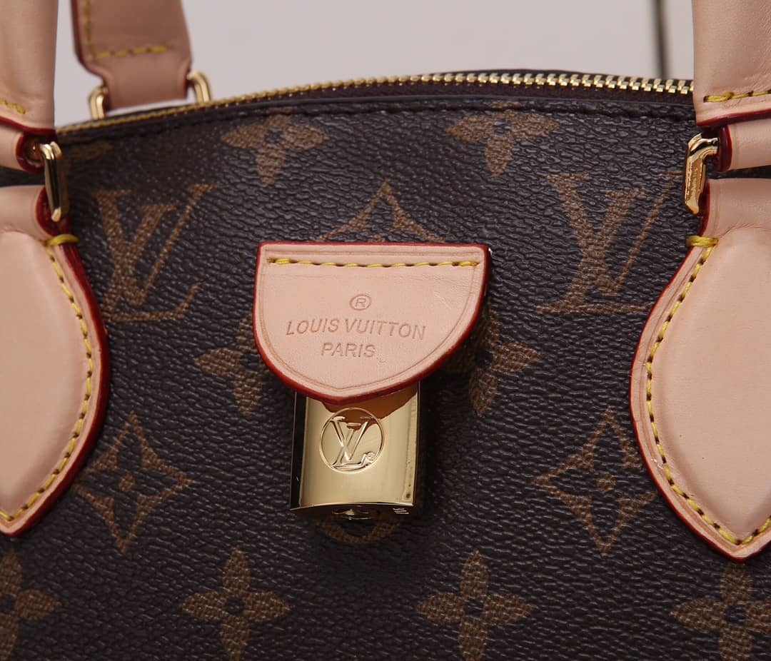 L0vis Vvtt0n Monogram Canvas Rivoli PM Replica Bag M44543