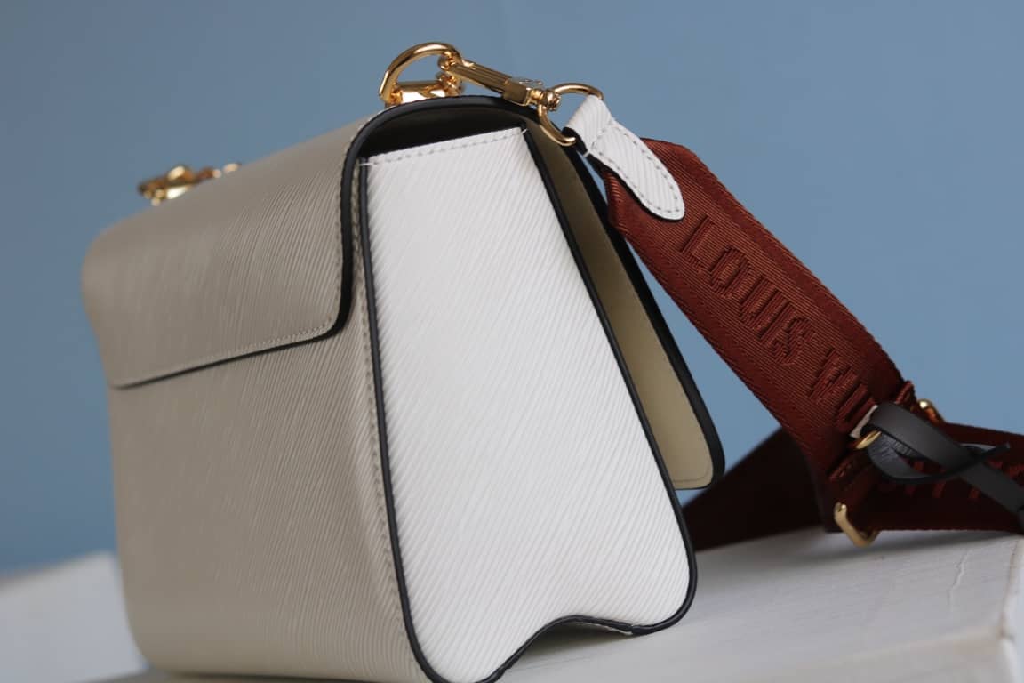 L0vis Vvtt0n Textured Epi Leather Twist Series Bag