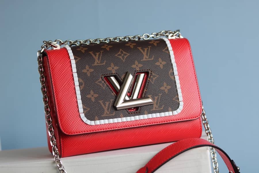 L0vis Vvtt0n Textured Epi Leather Twist Series Bag