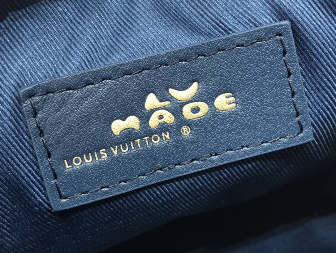L0vis Vvtt0n x Nigo Keepall XS Leather Monogram Denim Bag Replica Blue M81011