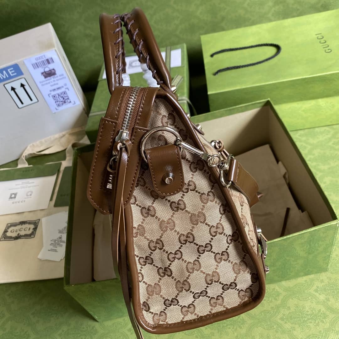 Gvc*1 x Ba1en*iaga GG Canvas City Bag Replica 658597