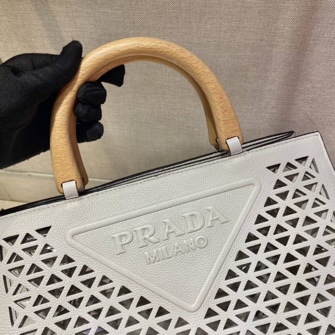 Pra*a Hollow Out Cowhide Leather Beech Tote