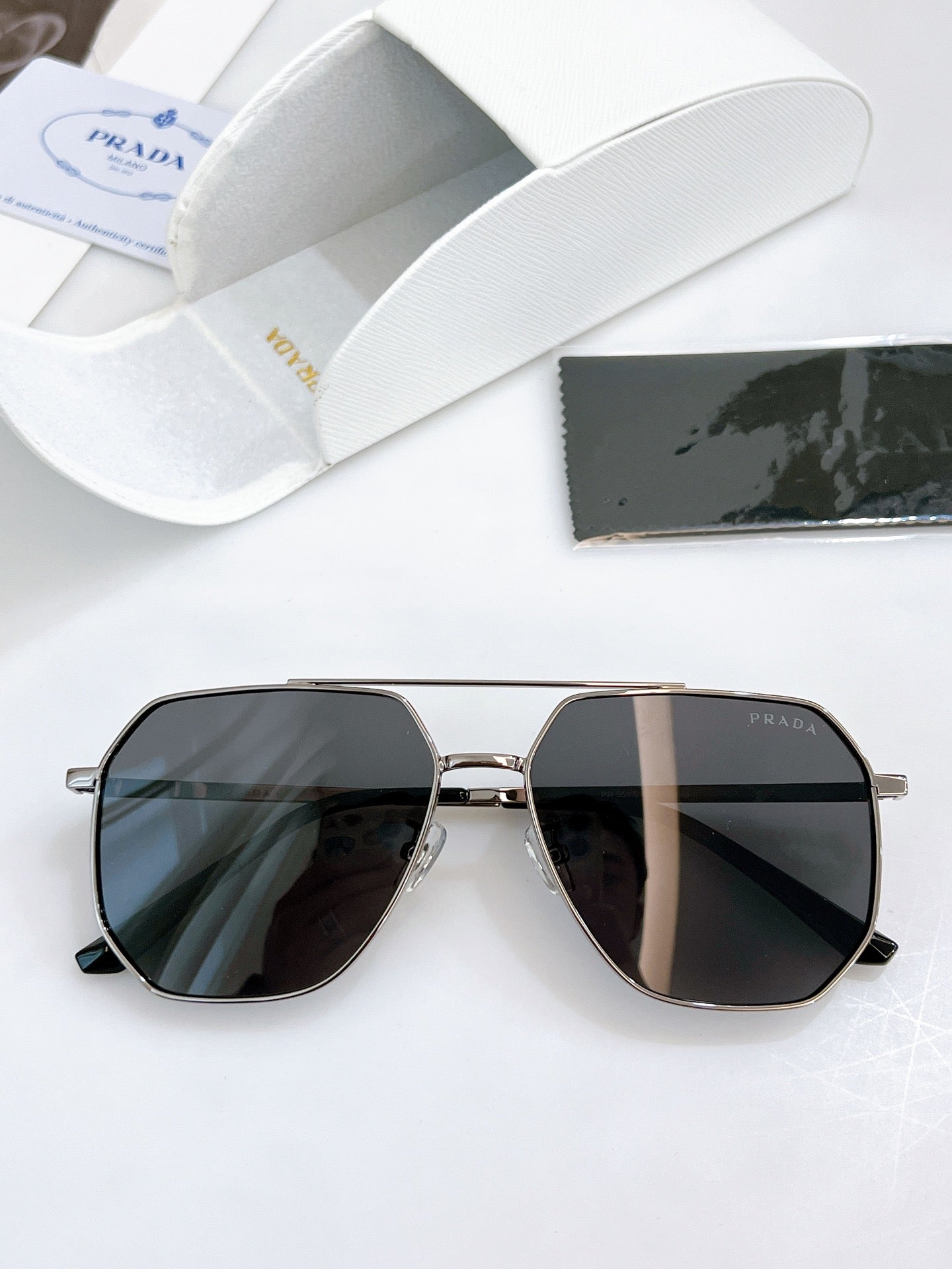 Pra*a Sunglasses