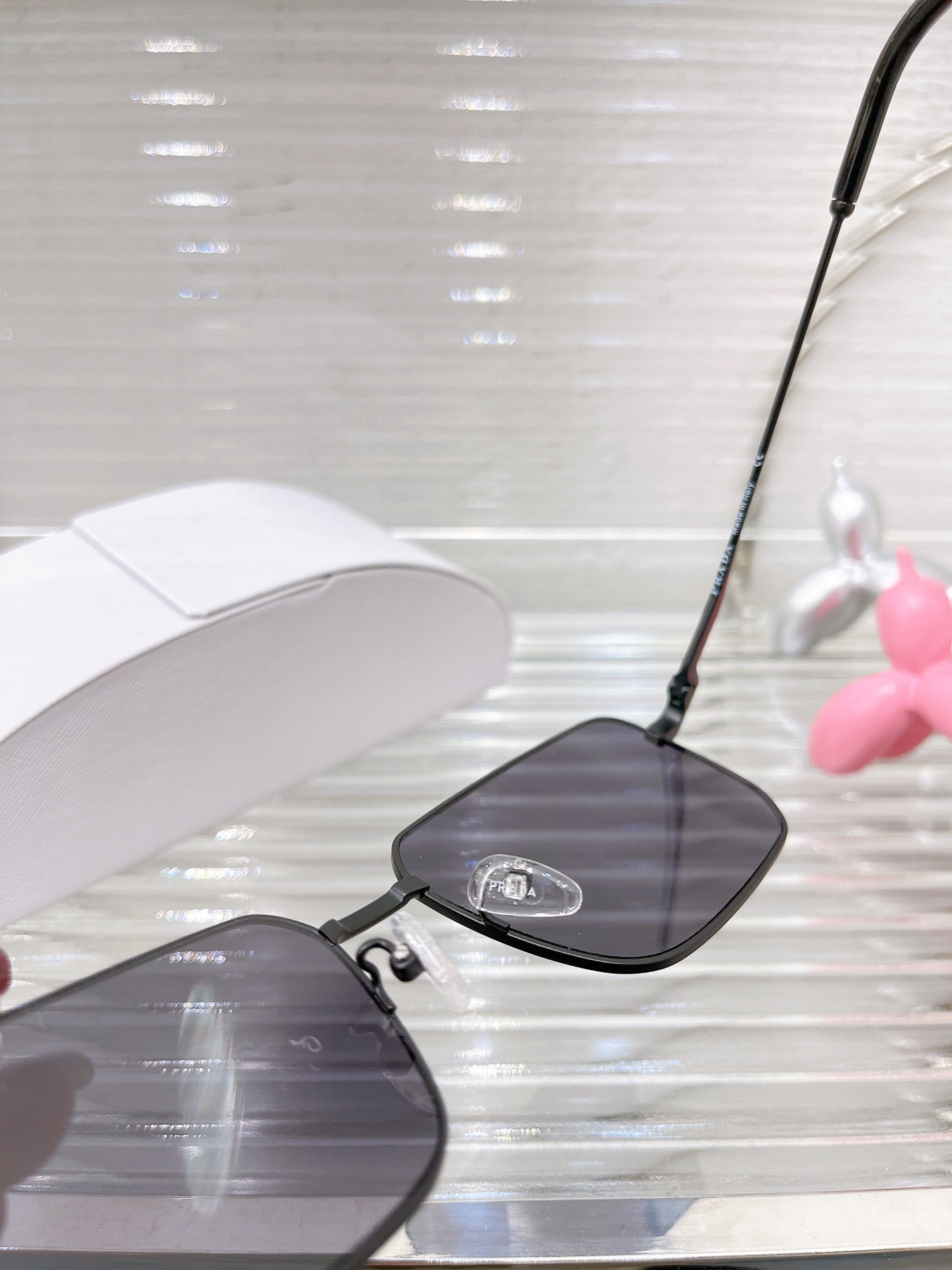 Pra*a Sunglasses