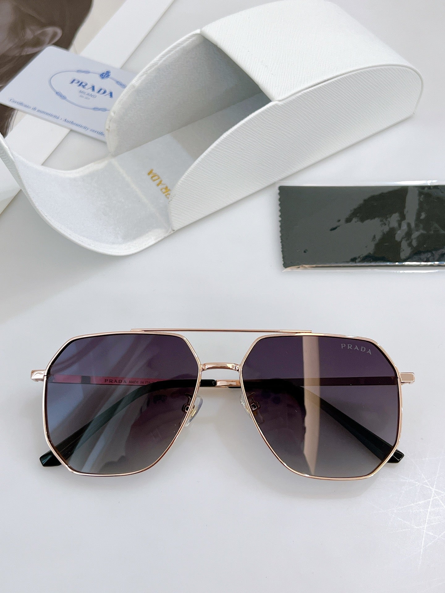 Pra*a Sunglasses