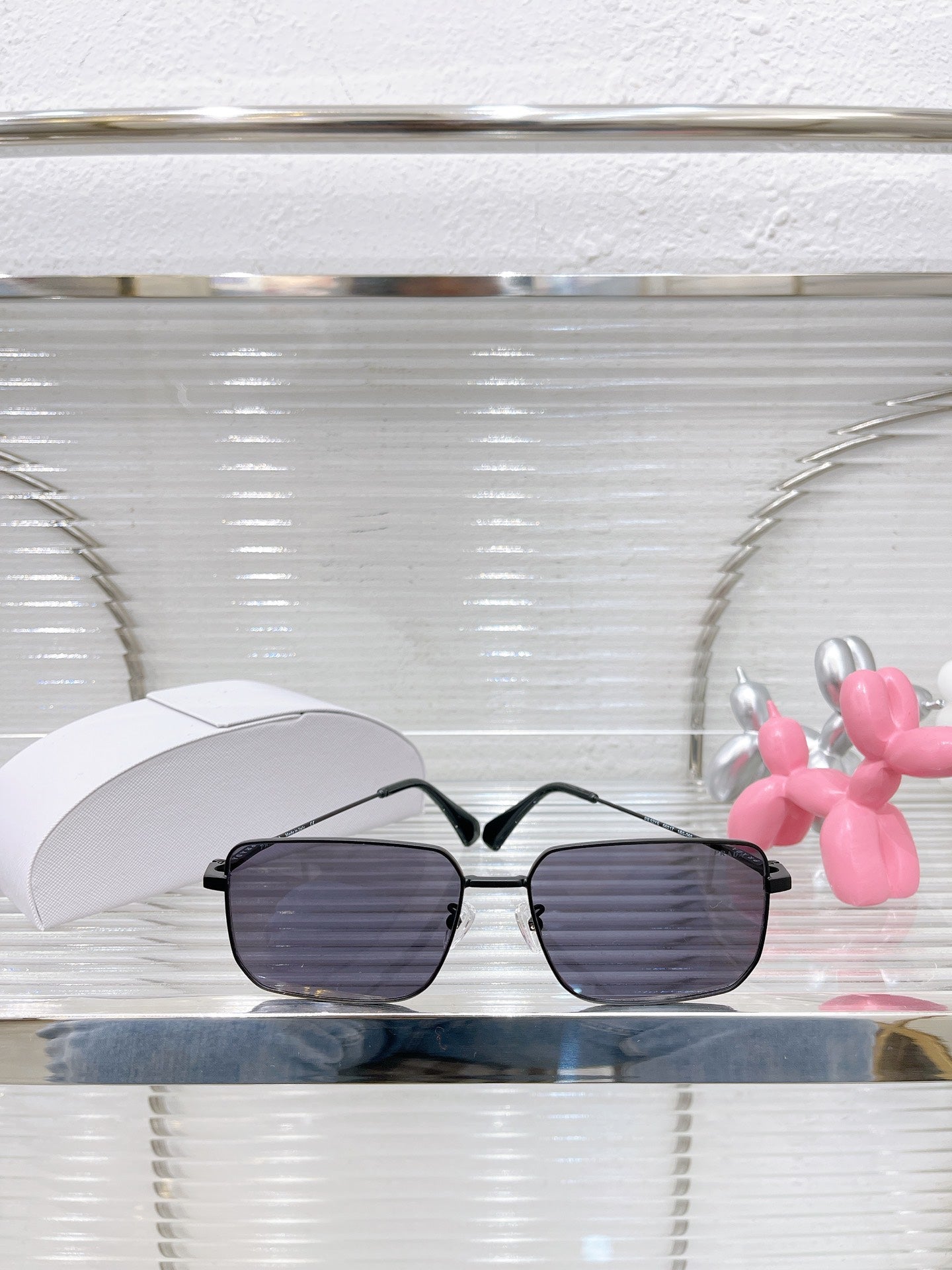 Pra*a Sunglasses