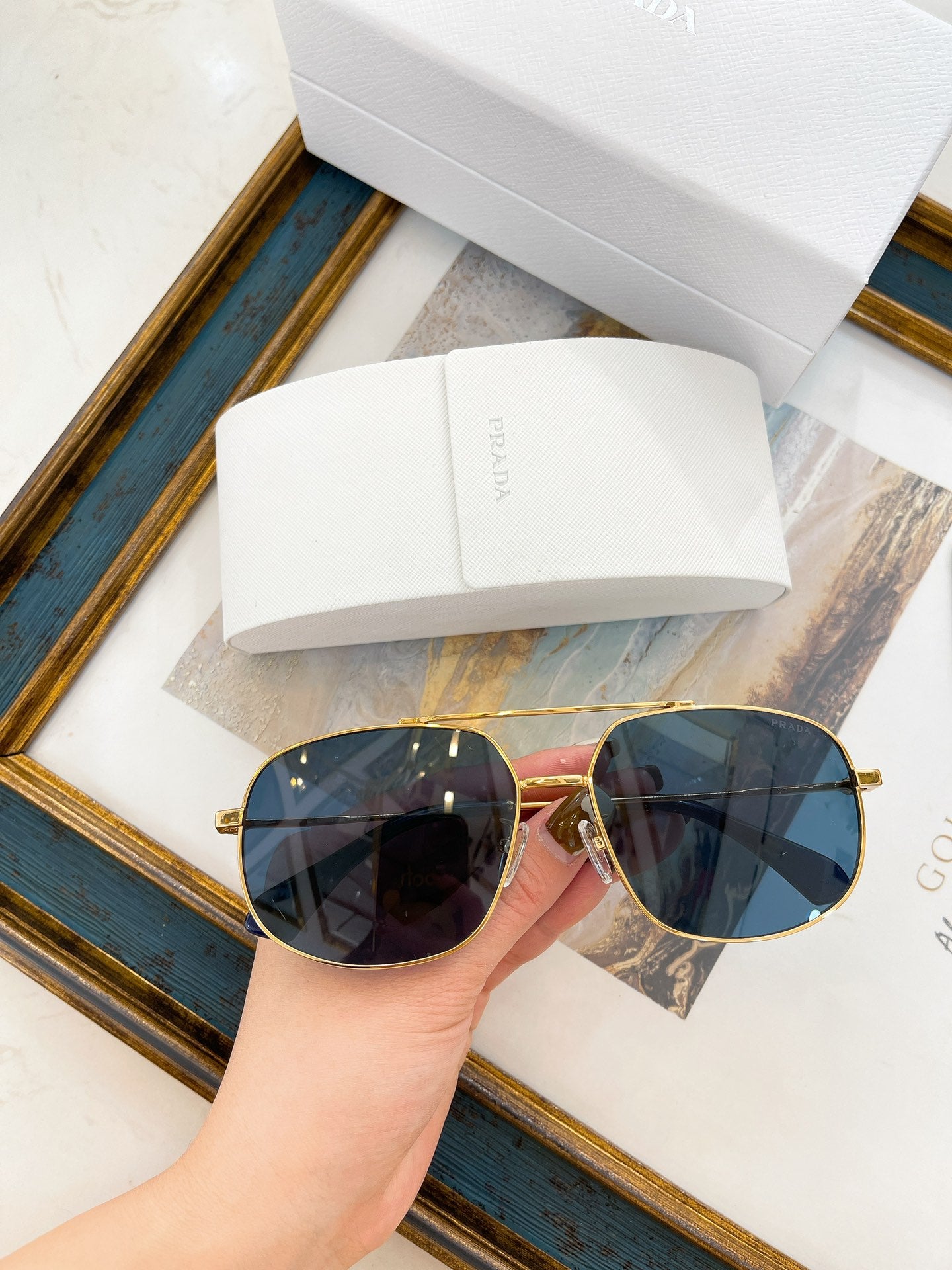 Pra*a Sunglasses